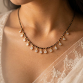 Gold Plated Traditional Black Beaded Mangalsutra with Sparkling Pear-Shaped Crystal Drop Pendants