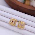 Delicate 22K Gold Plated Floral Stud Earrings with Ruby & Clear CZ Stones