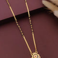 Modern Gold Plated Curved Paisley Pendant Mangalsutra with Ruby & CZ Accents for Women