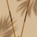 Traditional Gold-Plated Mangalsutra with Deity Pendant and Black Beaded Chain for Women