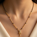 Elegant Gold-Plated Designer Mangalsutra with CZ Stone Pendent and Black Beaded Chain