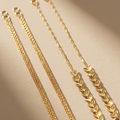 Elegant Gold-Tone Ear Support Chains with Leaf and Fine Link Details